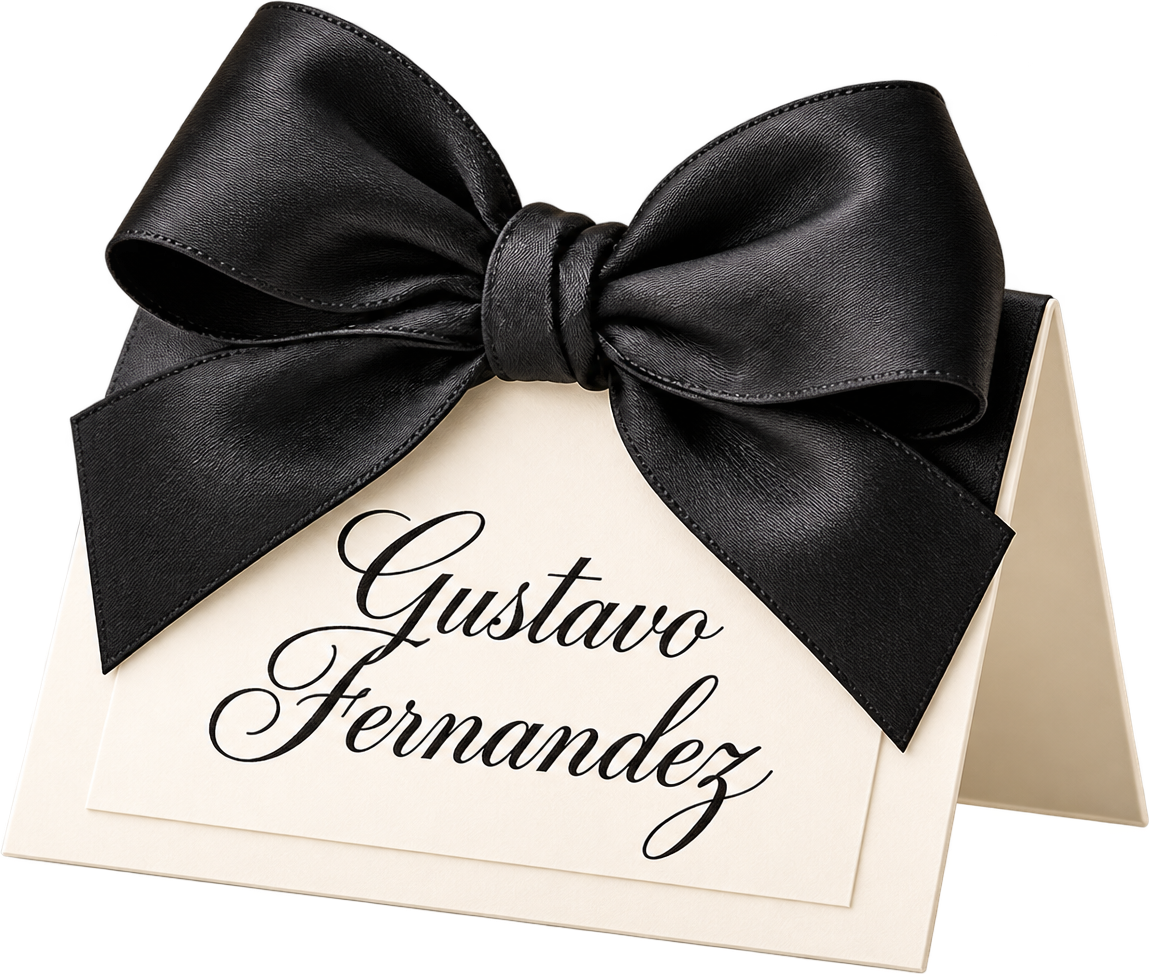 Calligraphed place card with a black satin bow